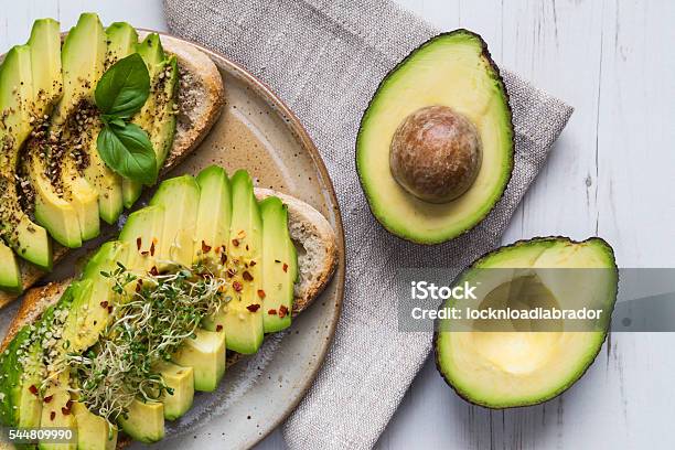 Toast With Avocado And Cress Stock Photo - Download Image Now - Avocado, Salad, Bread