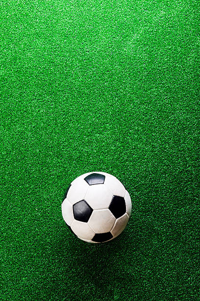 istock Soccer ball against artificial turf. Studio shot. Copy space. 544810030