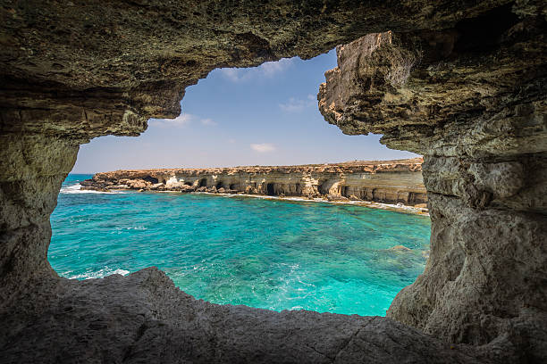 istock Cyprus caves like a window with crystal clear waters 544811522