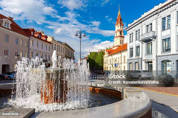Fountain And Church Old Town Vilnius Lithuania Stock Photo - Download Image Now - Architecture, Baltic Countries, Basilica