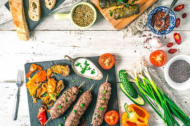 istock Kebabs with dolma, seasoning and vegetable horizontal 544813934