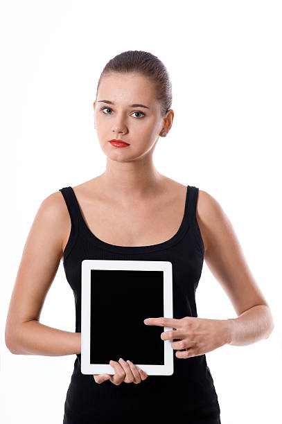 istock Cute young woman showing blank tablet screen 544815798