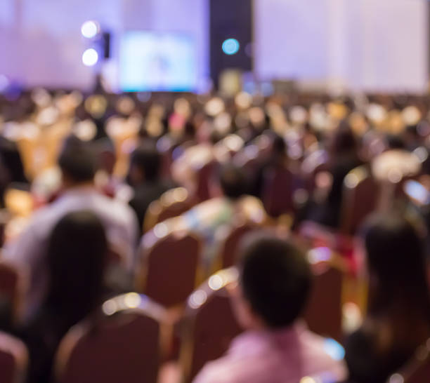 istock Blur audience sitting in hall or auditorium or classroom 544816614