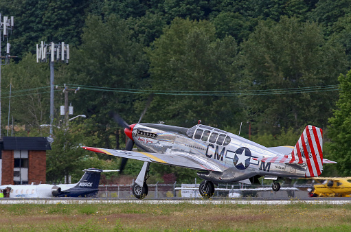 Seattle, Wa, United States - July 3, 2016: A very rare P-51C Mustang owned by the Collings Foundation was seeing flying in the skies over Seattle, WA. This is 1 of only 5 built during WWII.