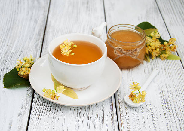 istock cup of herbal tea with linden flowers 544958272
