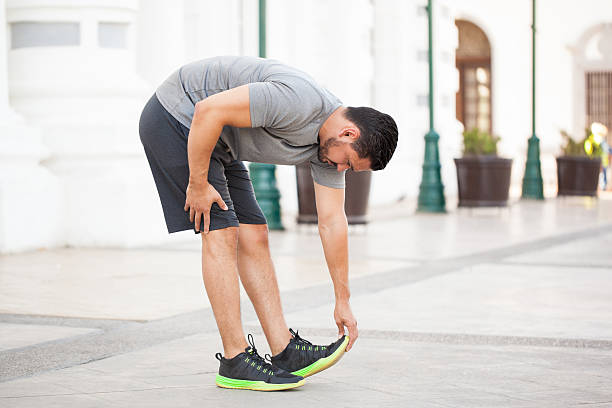 istock Man stretching before working out outdoors 544958316