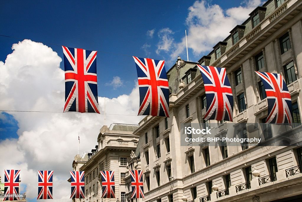Union Jack flags across Pall Mall London Flags up along the streets of London for the celebration of the Queen's 90th birthday. Pall Mall Stock Photo