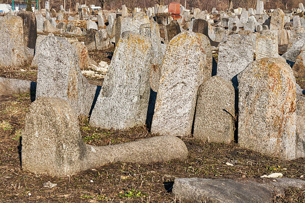 istock Fallen gravestones of ancient Jewish cemetery 544972114