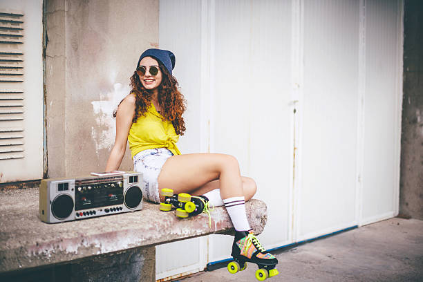 Hip hop style female with boom box radio and roller skates