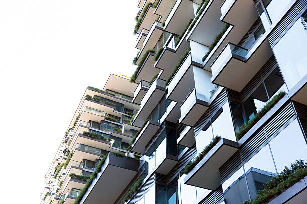 istock Closeup modern apartment building against white background, copy space 544977472