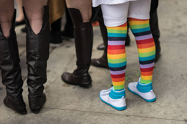 istock Young woman in a crowd celebrating Pride Parade. 544978642