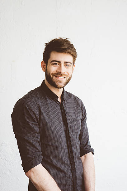 istock Portrait of a cheerful young man 544978912