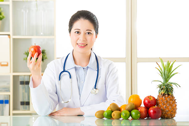 istock Doctor nutritionist with fruits 544981744