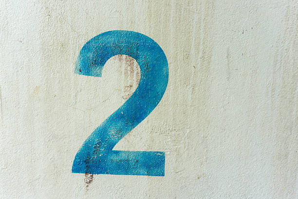 istock the number 2 on the dirty white wall 544982152