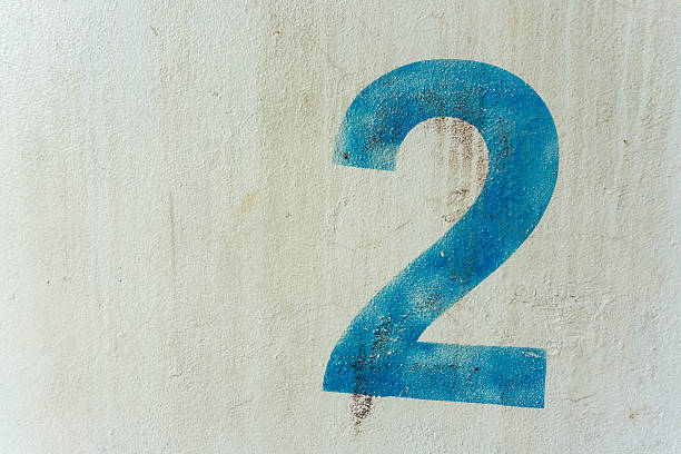 istock the number 2 on the dirty white wall 544982406