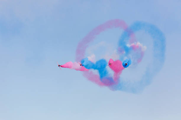 Swansea, UK: July 03, 2016: The Red Arrows display team fly in formation at Swansea Air Show. The annual free event attracts thousands of visitors.
