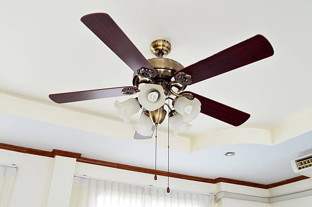 istock lamp with mounted propeller isolated in room 544985710