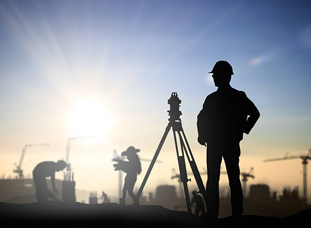 istock Silhouette Successful male engineer standing survey work on cons 544986478