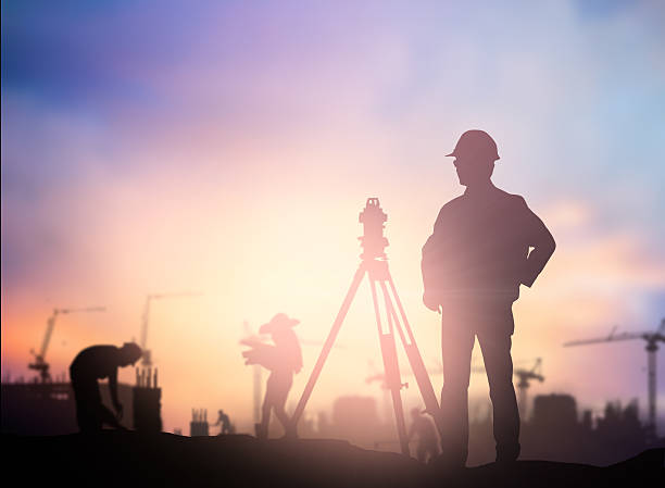 istock Silhouette Successful male engineer standing survey work on cons 544986508