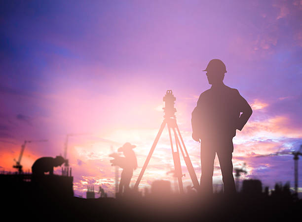 istock Silhouette Successful male engineer standing survey work on cons 544986536