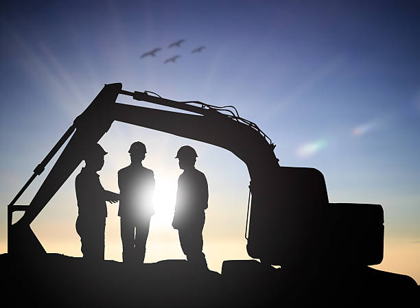 istock Silhouette Successful male engineer standing survey work on cons 544986674
