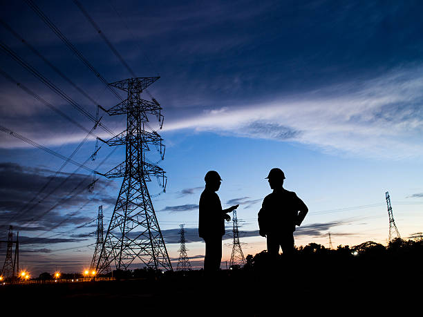 istock Silhouette Successful male engineer standing survey work on cons 544986772