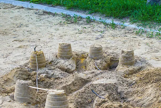 Photo of sand castle built by small children