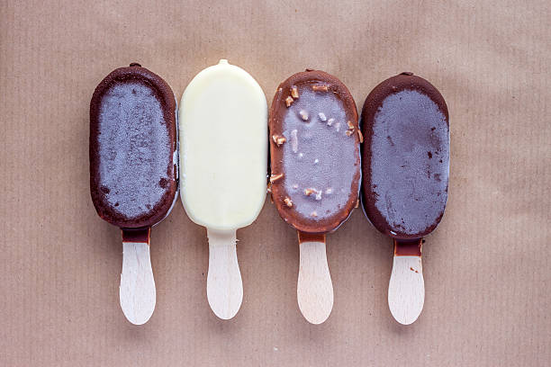 istock four ice creams on craft background 544989512