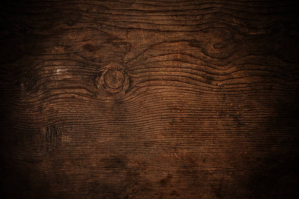 istock Old dark wood texture with grain, with vignette border 544989558