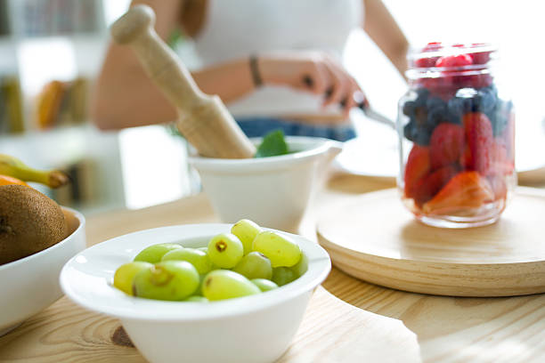 istock Beautiful young woman preparing breakfast at home. 544992226