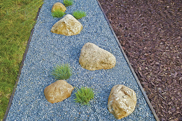 istock garden path of blue pebbles with stone 544993760