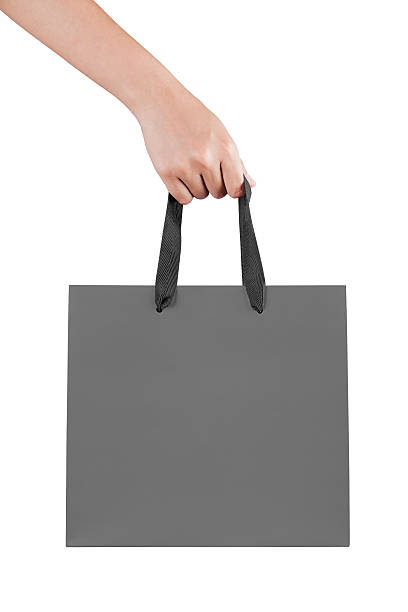 istock Female(woman) hand hold a gray shopping bag(paper bag) 544995162