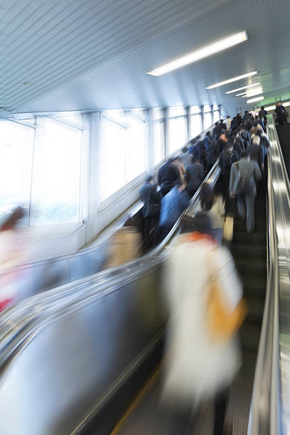 istock Tokyo City Commuters on the Escalator 544995330