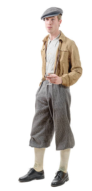 istock Young man with clothes and cap in 40s style. 544995582