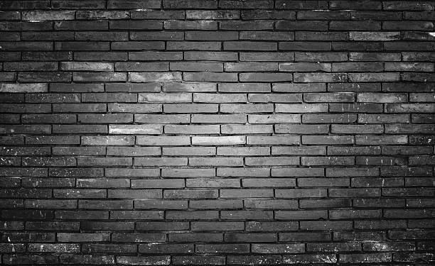 istock Old and dirty brick wall black background, texture. 544995990