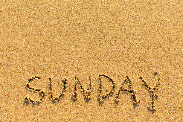 Sunday - drawn on the sand beach. Sunday - drawn on the sand beach. sand river stock pictures, royalty-free photos & images