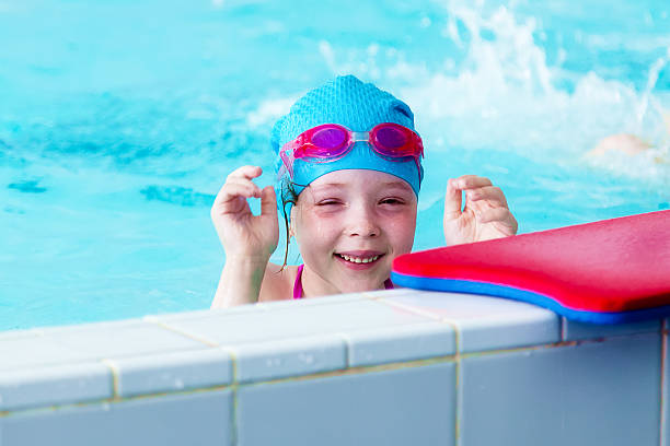 istock Girl swimming in the pool 545082776
