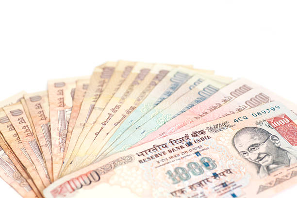 istock Indian Currency Rupee bank notes on white background 545084158