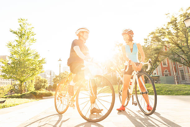 istock Two japanese cyclists chatting after a ride 545087450