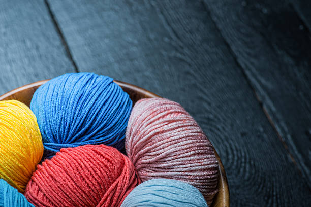 istock Colorful knitting yarn balls in basket 545087518
