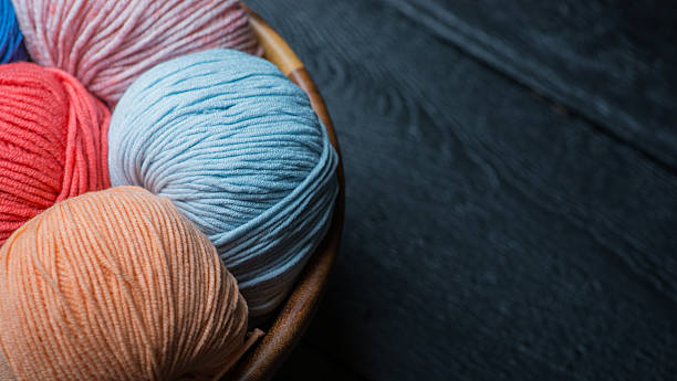 istock Colorful knitting yarn balls in basket 545087720