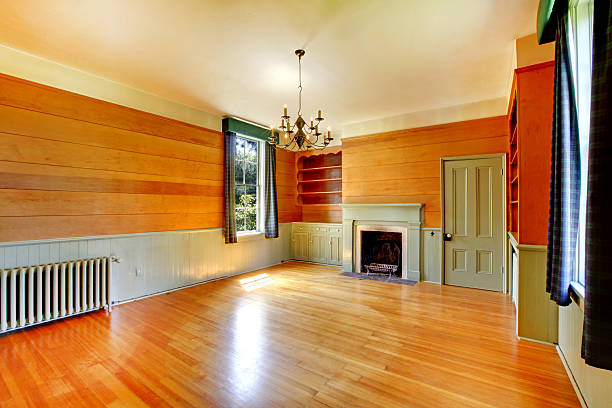 istock Bright empty wooden living room interior with fireplace 545087852
