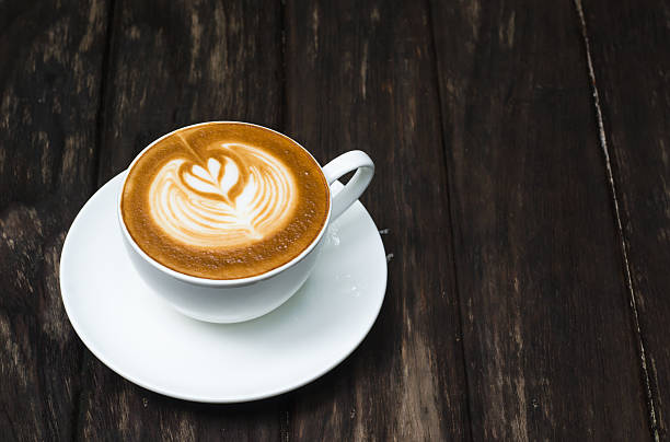 istock Barista making a cup of coffee soft focus image . 545088764