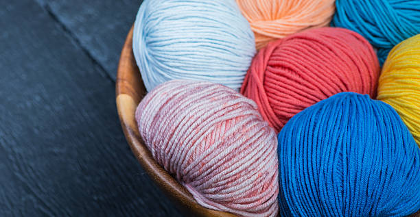 istock Colorful knitting yarn balls in basket 545088902