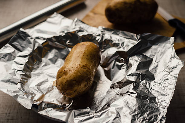 istock Cooking stuffed baked potato 545092930