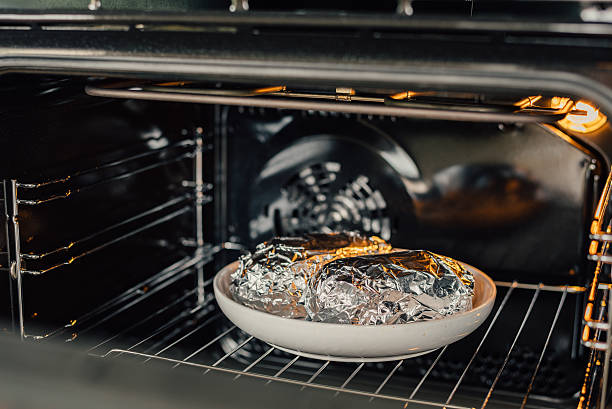 istock Cooking stuffed baked potato 545093752