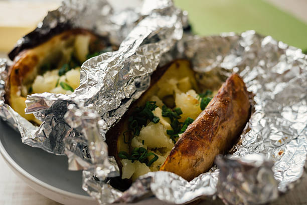 istock Cooking stuffed baked potato 545094362