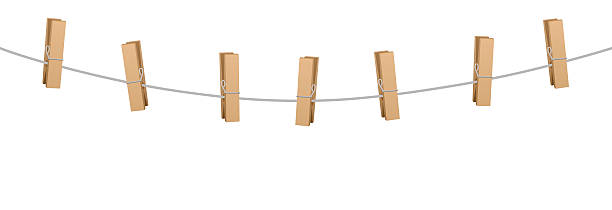 Clothes Pins Clothes Line Rope Seven Wooden Pegs Clothes pins on a clothes line rope holding nothing. clothespin wood stock illustrations