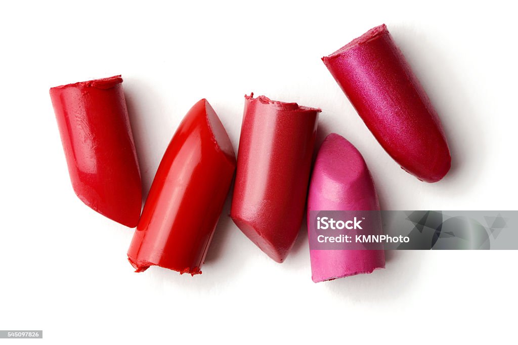 red and pink lipsticks lipsticks isolated on white Lipstick Stock Photo
