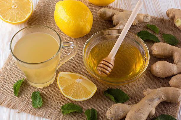 istock Cup of Ginger tea with lemon and honey. 545101270